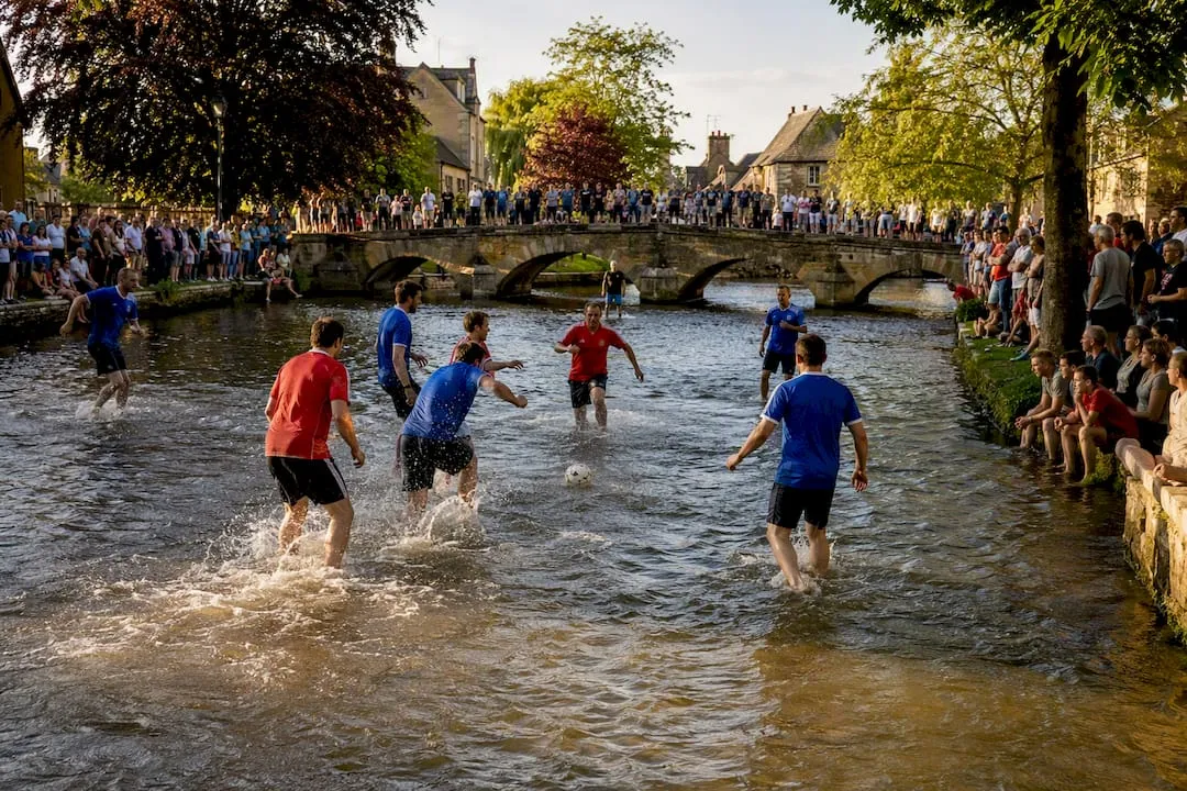 Football match played in Bourton river