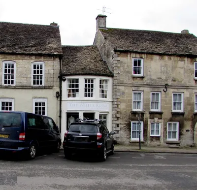 Black car, White Room, High Street, Minchinhampton