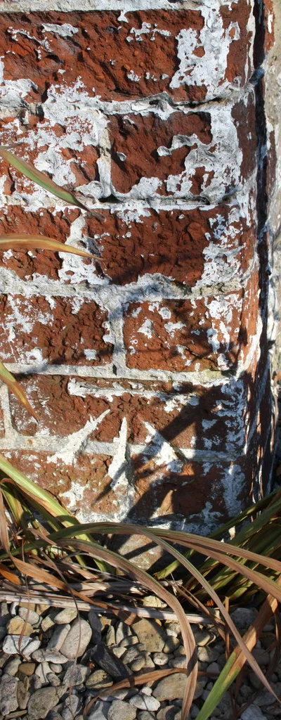 Benchmark on outbuilding at La Fontana restaurant