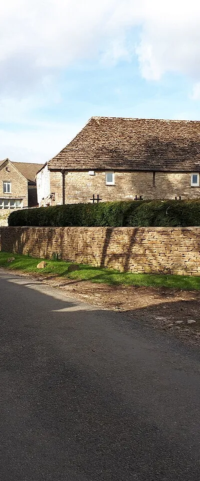 Approaching Culkerton near Manor Farm