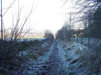 Byway near Upper Slaughter The byway runs between two minor roads around Manor Farm.  On a beautiful sunny January day, the byway remains frozen as the sun has not been able to reach it.
