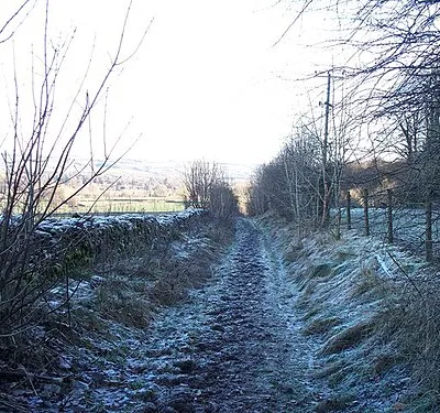 Byway near Upper Slaughter The byway runs between two minor roads around Manor Farm.  On a beautiful sunny January day, the byway remains frozen as the sun has not been able to reach it.