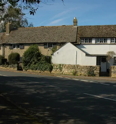 Cottages in Gotherington Cottages overlooking the war memorial in Gotherington.