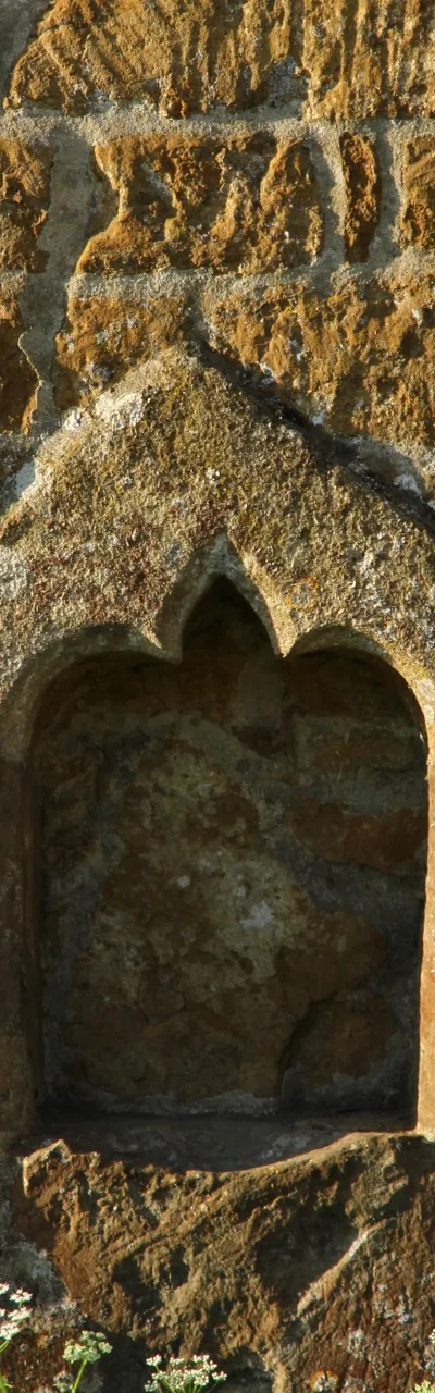 Piscina of the former north chapel of All Saints' parish church, Mollington, Oxfordshire, on the outside of the north wall of the chancel