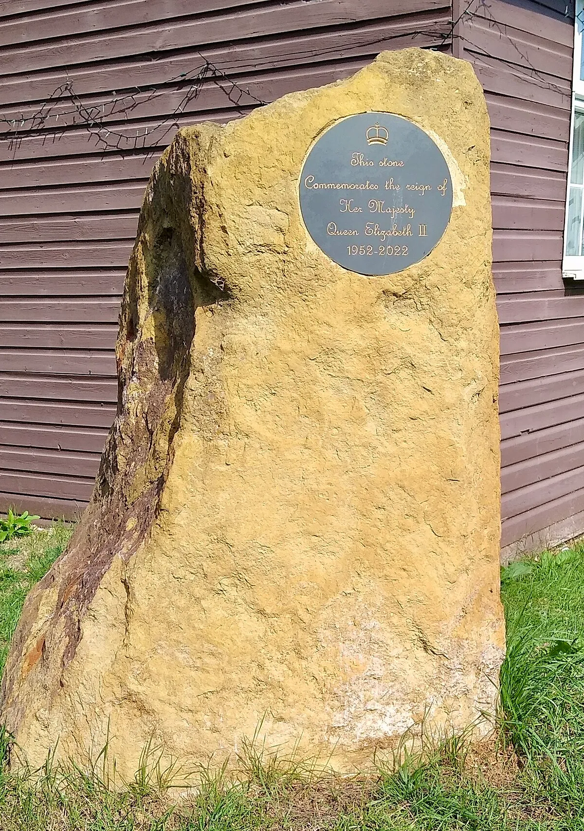 Commemoration stone for Elizabeth II, Village Hall, Farnborough, Warwickshire, in August 2025