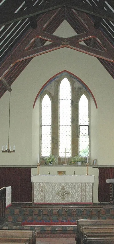 Church of England parish church of St John the Evangelist, Hempton, Oxfordshire: interior of nave, looking east to the chancel. The two arches of the north arcade are on the left.