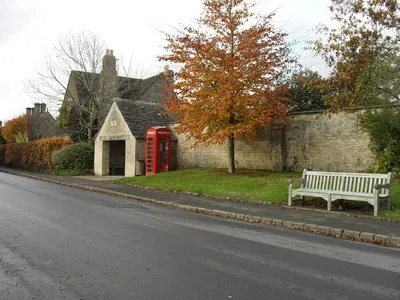 Bus shelter, phone box and bench in Hatherop