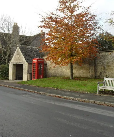 Bus shelter, phone box and bench in Hatherop