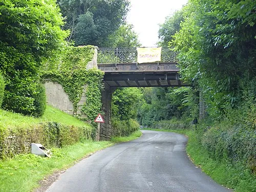 Bridge over road to Rendcomb College
.mw-parser-output .messagebox{margin:4px 0;width:auto;border-collapse:collapse;border:2px solid var(--border-color-progressive,#6485d1);background-color:var(--background-color-neutral-subtle,#fbfcff);color:var(--color-base,#202122);box-sizing:border-box;border-inline-start-width:8px}.mw-parser-output .messagebox.mbox-small{font-size:88%;line-height:1.25em}.mw-parser-output .mbox-warning,.mw-parser-output .mbox-speedy{border:2px solid var(--border-color-error,#b22222);background:var(--background-color-error-subtle,#ffdbdb);border-inline-start-width:8px}.mw-parser-output .mbox-serious,.mw-parser-output .mbox-delete,.mw-parser-output .mbox-stop{border:2px solid var(--border-color-error,#b22222);border-inline-start-width:8px}.mw-parser-output .mbox-issue,.mw-parser-output .mbox-content{border:2px solid #f28500;background:var(--background-color-warning-subtle,#ffe);border-inline-start-width:8px}.mw-parser-output .mbox-query,.mw-parser-output .mbox-style{border:2px solid #f4c430;background:var(--background-color-warning-subtle,#ffe);border-inline-start-width:8px}.mw-parser-output .mbox-shit{border:2px solid #960;border-inline-start-width:8px}.mw-parser-output .mbox-license{border:2px solid #88a;border-inline-start-width:initial}.mw-parser-output .mbox-legal{border:2px solid var(--border-color-notice,#666);background:var(--background-color-base,#fff);border-inline-start-width:8px}.mw-parser-output .mbox-honor{border:2px solid #ca3;background:var(--background-color-warning-subtle,#fcf4db);border-inline-start-width:8px}.mw-parser-output .mbox-growth{border:2px solid #8d4;background:var(--background-color-success-subtle,#d5fdf4);border-inline-start-width:8px}.mw-parser-output .mbox-move{border:2px solid #93c;border-inline-start-width:8px}.mw-parser-output .mbox-protection,.mw-parser-output .mbox-message{border:2px solid var(--border-color-base,#aaa);border-inline-start-width:8px}.mw-parser-output .messagebox .mbox-text{border:none;padding:0.25em 0.9em;width:100%}.mw-parser-output .messagebox .mbox-image{border:none;padding:2px 0 2px 0.9em;text-align:center}.mw-parser-output .messagebox .mbox-imageright{border:none;padding:2px 0.9em 2px 0;text-align:center}.mw-parser-output .messagebox .mbox-empty-cell{border:none;padding:0;width:1px}.mw-parser-output .messagebox .mbox-invalid-type{text-align:center}@media(min-width:720px){.mw-parser-output .messagebox{margin:4px 10%}.mw-parser-output .messagebox.mbox-small{clear:right;float:right;margin:4px 0 4px 1em;width:238px}}body.skin--responsive .mw-parser-output table.messagebox img{max-width:none!important}Wikidata has entry Bridge over road to Rendcomb College (Q26447209) with data related to this item.