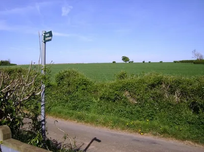Bridleway near A417 This lane enters the south east corner of the square as the bridleway leaves it. Beyond, extensive arable fields stretch into the square.