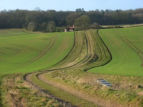 Track and farmland, Welford The footpath in the rolling landscape on the approach to Sole Farm.