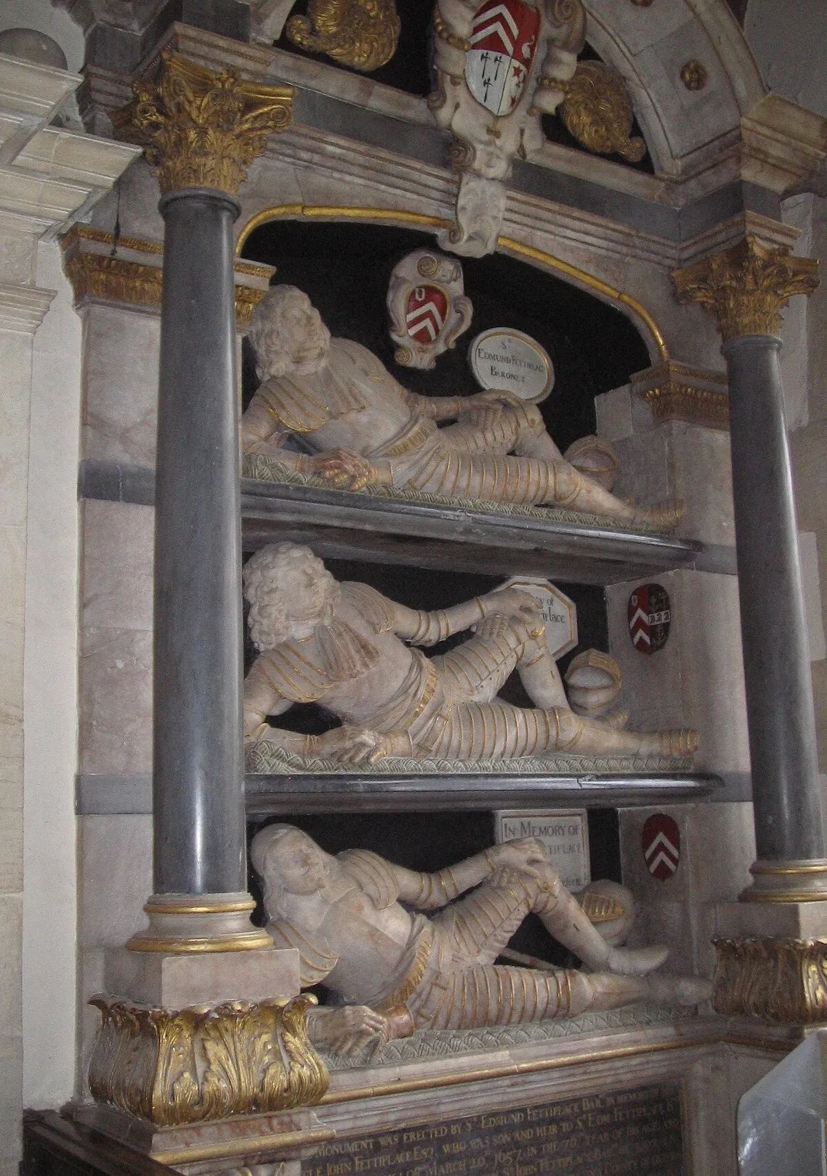 Church of England parish church of St. Mary, Swinbrook, Oxfordshire: early 17th-century monuments to Sir Edmund Fettiplace (died 1613) and his father and grandfather.