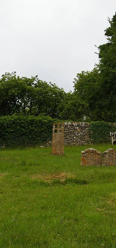 Duntisbourne Rous: preaching cross in churchyard