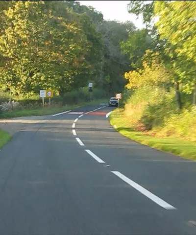 B4077 approaching the River Dirkler bridge