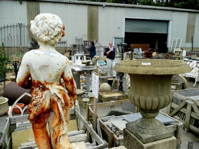 "Shoppers" at Cotswold Reclamation One lady appears to be photographing a collection of bathroom ceramics!
