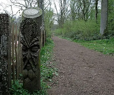 A "Green Man" marker post