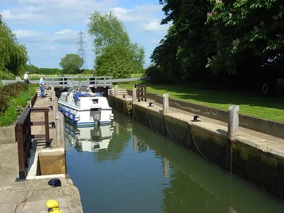 Grafton Lock, River Thames, Oxfordshire: a boat travelling downstream.