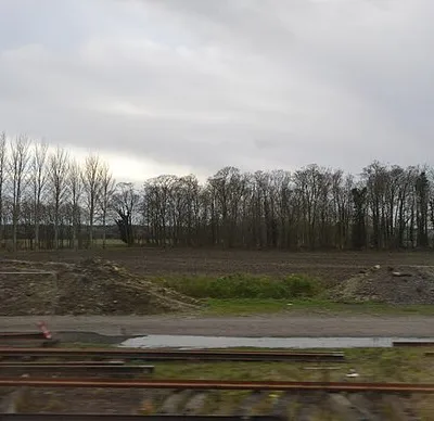 Waste ground by the main line