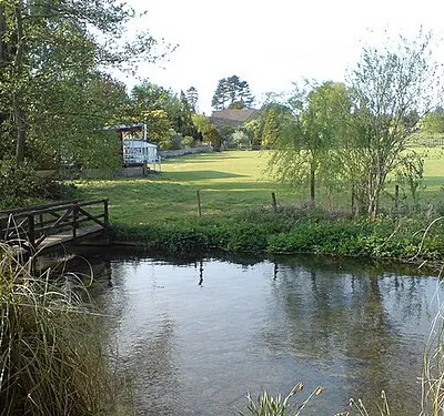 Ampney Brook and Cricket Ground, Ampney Crucis To see this view, you need to stay in Room 9 of the Cross of Crucis Hotel (a nice hotel, good reputation for food, but my bed was a bit uncomfortable, nevertheless I'd stay there again).