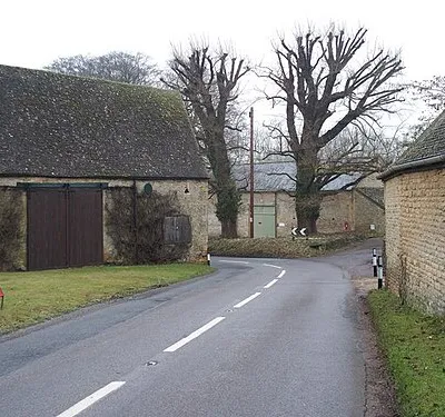 Barns at Upper Swell As the B4077 traverses Upper Swell, it takes a sharp bend as it passes between these three barns.