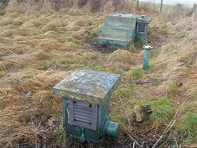 Ventilator (foreground) and entrance (beyond) of a disused bunker beside the B4000 road on Ashbury Hill, Oxfordshire (formerly Berkshire)