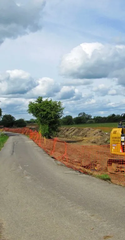 Access road to Rushey Weir & Lock, and excavator, near Tadpole Bridge, Oxon