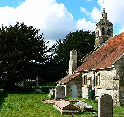 St Andrew's churchyard, Blunsdon St Andrew, Wiltshire: south side of the churchyard, looking west
