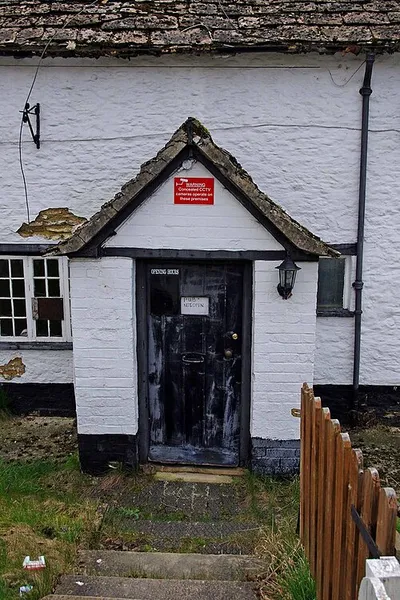 Axe & Compass (3) - entrance door, High Street, Kempsford