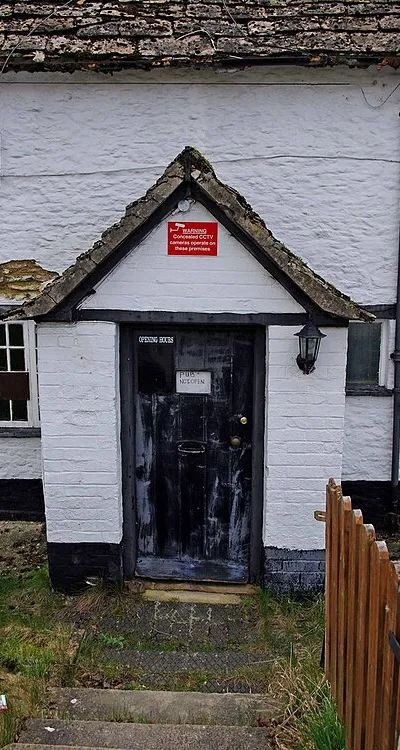 Axe & Compass (3) - entrance door, High Street, Kempsford