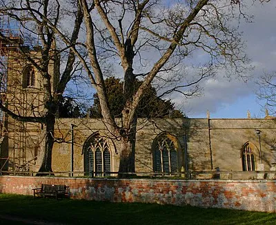 Church of St Mary, Preston on Stour The south side of the church. The tower is undergoing some restoration work as evidenced by the scaffolding.