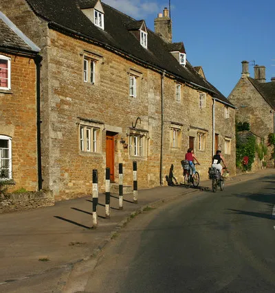 Cotswold Houses, Little Rissington A view up the main street.
