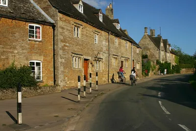 Cotswold Houses, Little Rissington A view up the main street.
