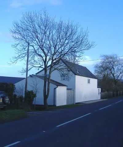 Cottage at Cotmarsh Adapted to cope with its close proximity to a busy minor road.