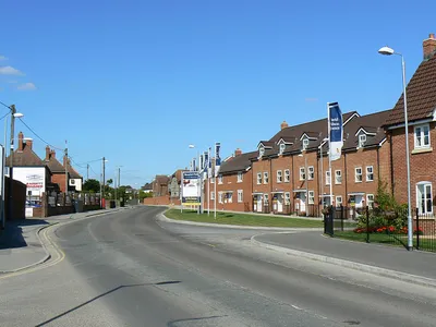 Station Road, Wootton Bassett. The entrance in the lower left corner leads to the town's fire station 1481519 The new housing on the right is part of a large development on an old dairy factory 1210189