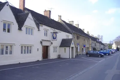 West side of the High Street The closest building, is the former Angel Inn.