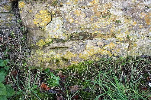 Benchmark on Paddock House outbuilding