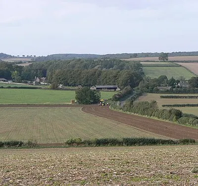 Asthall, Oxfordshire The hamlet of Asthall lies roughly midway between Burford to the west and Witney to the east. The barn at the centre of the image appears to be on the line of the Roman road of Akeman Street.