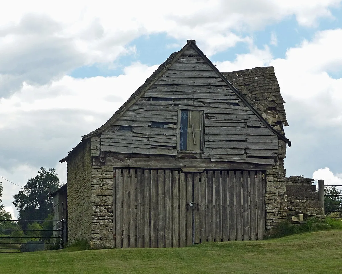 Barn circa 17 metres west of Combe House: Grade II listed building in Sheepscombe, Gloucestershire, UK.
.mw-parser-output .messagebox{margin:4px 0;width:auto;border-collapse:collapse;border:2px solid var(--border-color-progressive,#6485d1);background-color:var(--background-color-neutral-subtle,#fbfcff);color:var(--color-base,#202122);box-sizing:border-box;border-inline-start-width:8px}.mw-parser-output .messagebox.mbox-small{font-size:88%;line-height:1.25em}.mw-parser-output .mbox-warning,.mw-parser-output .mbox-speedy{border:2px solid var(--border-color-error,#b22222);background:var(--background-color-error-subtle,#ffdbdb);border-inline-start-width:8px}.mw-parser-output .mbox-serious,.mw-parser-output .mbox-delete,.mw-parser-output .mbox-stop{border:2px solid var(--border-color-error,#b22222);border-inline-start-width:8px}.mw-parser-output .mbox-issue,.mw-parser-output .mbox-content{border:2px solid #f28500;background:var(--background-color-warning-subtle,#ffe);border-inline-start-width:8px}.mw-parser-output .mbox-query,.mw-parser-output .mbox-style{border:2px solid #f4c430;background:var(--background-color-warning-subtle,#ffe);border-inline-start-width:8px}.mw-parser-output .mbox-shit{border:2px solid #960;border-inline-start-width:8px}.mw-parser-output .mbox-license{border:2px solid #88a;border-inline-start-width:initial}.mw-parser-output .mbox-legal{border:2px solid var(--border-color-notice,#666);background:var(--background-color-base,#fff);border-inline-start-width:8px}.mw-parser-output .mbox-honor{border:2px solid #ca3;background:var(--background-color-warning-subtle,#fcf4db);border-inline-start-width:8px}.mw-parser-output .mbox-growth{border:2px solid #8d4;background:var(--background-color-success-subtle,#d5fdf4);border-inline-start-width:8px}.mw-parser-output .mbox-move{border:2px solid #93c;border-inline-start-width:8px}.mw-parser-output .mbox-protection,.mw-parser-output .mbox-message{border:2px solid var(--border-color-base,#aaa);border-inline-start-width:8px}.mw-parser-output .messagebox .mbox-text{border:none;padding:0.25em 0.9em;width:100%}.mw-parser-output .messagebox .mbox-image{border:none;padding:2px 0 2px 0.9em;text-align:center}.mw-parser-output .messagebox .mbox-imageright{border:none;padding:2px 0.9em 2px 0;text-align:center}.mw-parser-output .messagebox .mbox-empty-cell{border:none;padding:0;width:1px}.mw-parser-output .messagebox .mbox-invalid-type{text-align:center}@media(min-width:720px){.mw-parser-output .messagebox{margin:4px 10%}.mw-parser-output .messagebox.mbox-small{clear:right;float:right;margin:4px 0 4px 1em;width:238px}}body.skin--responsive .mw-parser-output table.messagebox img{max-width:none!important}Wikidata has entry Barn circa 17 metres west of Combe House (Q26383312) with data related to this item.
