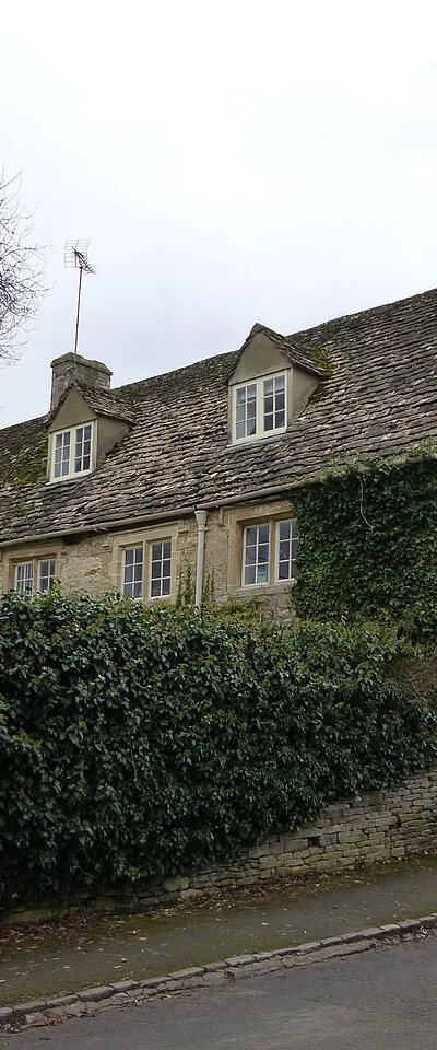 25 and 26, Hatherop Road: Grade II listed building in Coln St. Aldwyns, Gloucestershire.
.mw-parser-output .messagebox{margin:4px 0;width:auto;border-collapse:collapse;border:2px solid var(--border-color-progressive,#6485d1);background-color:var(--background-color-neutral-subtle,#fbfcff);color:var(--color-base,#202122);box-sizing:border-box;border-inline-start-width:8px}.mw-parser-output .messagebox.mbox-small{font-size:88%;line-height:1.25em}.mw-parser-output .mbox-warning,.mw-parser-output .mbox-speedy{border:2px solid var(--border-color-error,#b22222);background:var(--background-color-error-subtle,#ffdbdb);border-inline-start-width:8px}.mw-parser-output .mbox-serious,.mw-parser-output .mbox-delete,.mw-parser-output .mbox-stop{border:2px solid var(--border-color-error,#b22222);border-inline-start-width:8px}.mw-parser-output .mbox-issue,.mw-parser-output .mbox-content{border:2px solid #f28500;background:var(--background-color-warning-subtle,#ffe);border-inline-start-width:8px}.mw-parser-output .mbox-query,.mw-parser-output .mbox-style{border:2px solid #f4c430;background:var(--background-color-warning-subtle,#ffe);border-inline-start-width:8px}.mw-parser-output .mbox-shit{border:2px solid #960;border-inline-start-width:8px}.mw-parser-output .mbox-license{border:2px solid #88a;border-inline-start-width:initial}.mw-parser-output .mbox-legal{border:2px solid var(--border-color-notice,#666);background:var(--background-color-base,#fff);border-inline-start-width:8px}.mw-parser-output .mbox-honor{border:2px solid #ca3;background:var(--background-color-warning-subtle,#fcf4db);border-inline-start-width:8px}.mw-parser-output .mbox-growth{border:2px solid #8d4;background:var(--background-color-success-subtle,#d5fdf4);border-inline-start-width:8px}.mw-parser-output .mbox-move{border:2px solid #93c;border-inline-start-width:8px}.mw-parser-output .mbox-protection,.mw-parser-output .mbox-message{border:2px solid var(--border-color-base,#aaa);border-inline-start-width:8px}.mw-parser-output .messagebox .mbox-text{border:none;padding:0.25em 0.9em;width:100%}.mw-parser-output .messagebox .mbox-image{border:none;padding:2px 0 2px 0.9em;text-align:center}.mw-parser-output .messagebox .mbox-imageright{border:none;padding:2px 0.9em 2px 0;text-align:center}.mw-parser-output .messagebox .mbox-empty-cell{border:none;padding:0;width:1px}.mw-parser-output .messagebox .mbox-invalid-type{text-align:center}@media(min-width:720px){.mw-parser-output .messagebox{margin:4px 10%}.mw-parser-output .messagebox.mbox-small{clear:right;float:right;margin:4px 0 4px 1em;width:238px}}body.skin--responsive .mw-parser-output table.messagebox img{max-width:none!important}Wikidata has entry 25 and 26, Hatherop Road (Q26590016) with data related to this item.