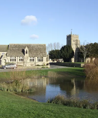 Ducklington, Oxfordshire: parish school and St Bartholomew's parish church