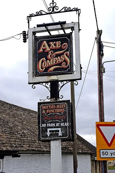 Axe & Compass (2) - pub sign, High Street, Kempsford