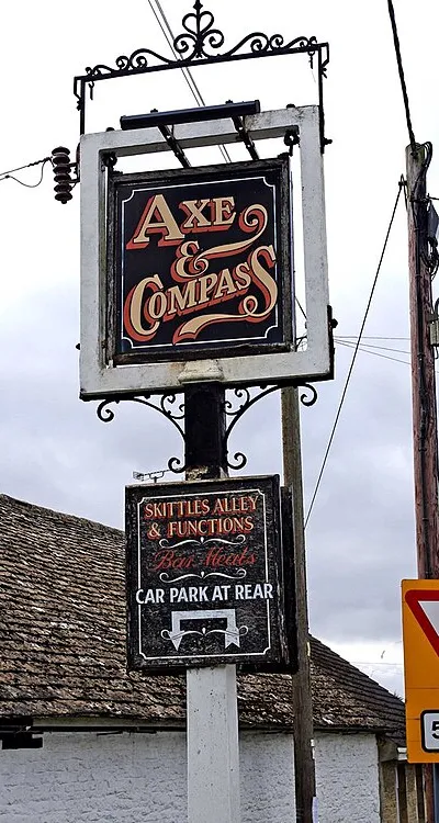 Axe & Compass (2) - pub sign, High Street, Kempsford