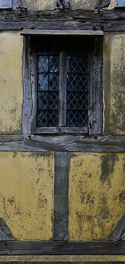 Besford, St.Peter's Church: Rare Decorated wooden tracery in the west window