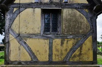 Besford, St.Peter's Church: Rare Decorated wooden tracery in the west window