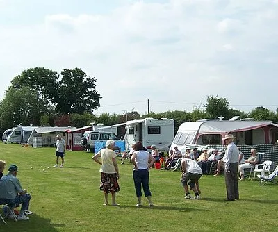 Boules at Wyre Piddle A good crowd of spectators had gathered - with their own chairs - to watch this game of Boules, being played at the Caravan Club Rally at Mill Lane Marina, Wyre Piddle.