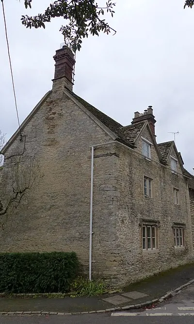 22, The Green: Grade II listed house in Coln St. Aldwyns, Gloucestershire.
.mw-parser-output .messagebox{margin:4px 0;width:auto;border-collapse:collapse;border:2px solid var(--border-color-progressive,#6485d1);background-color:var(--background-color-neutral-subtle,#fbfcff);color:var(--color-base,#202122);box-sizing:border-box;border-inline-start-width:8px}.mw-parser-output .messagebox.mbox-small{font-size:88%;line-height:1.25em}.mw-parser-output .mbox-warning,.mw-parser-output .mbox-speedy{border:2px solid var(--border-color-error,#b22222);background:var(--background-color-error-subtle,#ffdbdb);border-inline-start-width:8px}.mw-parser-output .mbox-serious,.mw-parser-output .mbox-delete,.mw-parser-output .mbox-stop{border:2px solid var(--border-color-error,#b22222);border-inline-start-width:8px}.mw-parser-output .mbox-issue,.mw-parser-output .mbox-content{border:2px solid #f28500;background:var(--background-color-warning-subtle,#ffe);border-inline-start-width:8px}.mw-parser-output .mbox-query,.mw-parser-output .mbox-style{border:2px solid #f4c430;background:var(--background-color-warning-subtle,#ffe);border-inline-start-width:8px}.mw-parser-output .mbox-shit{border:2px solid #960;border-inline-start-width:8px}.mw-parser-output .mbox-license{border:2px solid #88a;border-inline-start-width:initial}.mw-parser-output .mbox-legal{border:2px solid var(--border-color-notice,#666);background:var(--background-color-base,#fff);border-inline-start-width:8px}.mw-parser-output .mbox-honor{border:2px solid #ca3;background:var(--background-color-warning-subtle,#fcf4db);border-inline-start-width:8px}.mw-parser-output .mbox-growth{border:2px solid #8d4;background:var(--background-color-success-subtle,#d5fdf4);border-inline-start-width:8px}.mw-parser-output .mbox-move{border:2px solid #93c;border-inline-start-width:8px}.mw-parser-output .mbox-protection,.mw-parser-output .mbox-message{border:2px solid var(--border-color-base,#aaa);border-inline-start-width:8px}.mw-parser-output .messagebox .mbox-text{border:none;padding:0.25em 0.9em;width:100%}.mw-parser-output .messagebox .mbox-image{border:none;padding:2px 0 2px 0.9em;text-align:center}.mw-parser-output .messagebox .mbox-imageright{border:none;padding:2px 0.9em 2px 0;text-align:center}.mw-parser-output .messagebox .mbox-empty-cell{border:none;padding:0;width:1px}.mw-parser-output .messagebox .mbox-invalid-type{text-align:center}@media(min-width:720px){.mw-parser-output .messagebox{margin:4px 10%}.mw-parser-output .messagebox.mbox-small{clear:right;float:right;margin:4px 0 4px 1em;width:238px}}body.skin--responsive .mw-parser-output table.messagebox img{max-width:none!important}Wikidata has entry 22, The Green (Q26590056) with data related to this item.