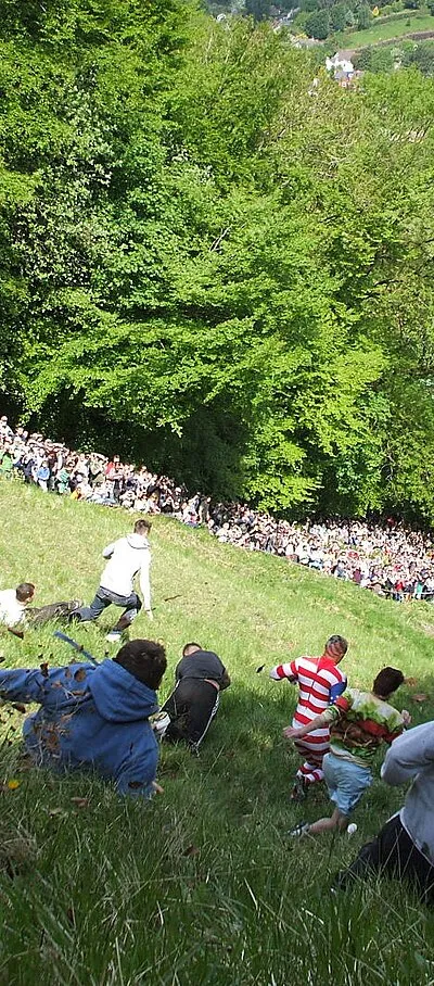 A race at The Cooper's Hill Cheese Rolling and Wake on 27th May 2013