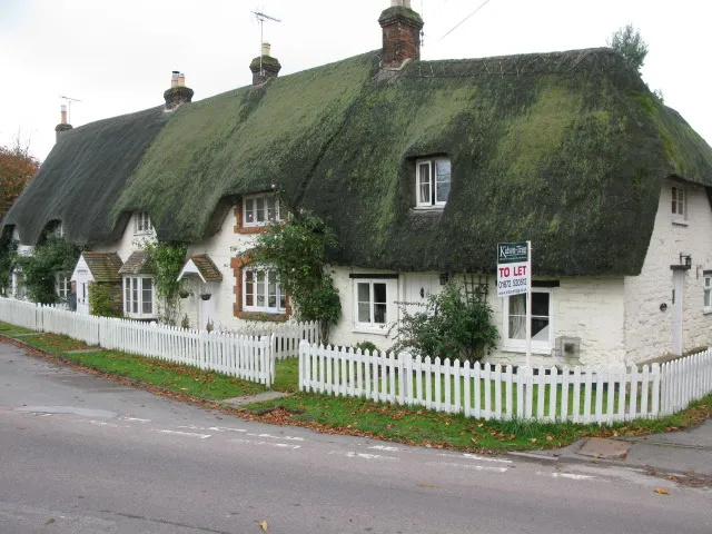 Row of thatched cottages in the High Street, Broad Hinton, Wiltshire