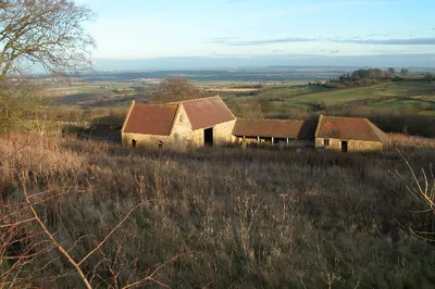 Stoke Hill Barn. These farm buildings are situated on the northern slopes of Ilmington Downs in south Warwickshire. At this point the escarpment of the cotswolds end and the land falls away to the lowlands of Warwickshire.
