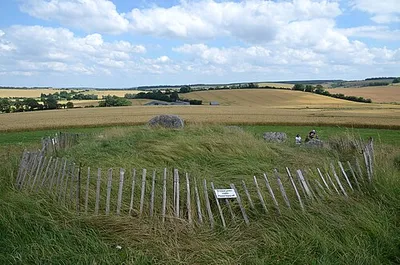 West Kennet long barrow, 800m south-east of Silbury Hill
.mw-parser-output .messagebox{margin:4px 0;width:auto;border-collapse:collapse;border:2px solid var(--border-color-progressive,#6485d1);background-color:var(--background-color-neutral-subtle,#fbfcff);color:var(--color-base,#202122);box-sizing:border-box;border-inline-start-width:8px}.mw-parser-output .messagebox.mbox-small{font-size:88%;line-height:1.25em}.mw-parser-output .mbox-warning,.mw-parser-output .mbox-speedy{border:2px solid var(--border-color-error,#b22222);background:var(--background-color-error-subtle,#ffdbdb);border-inline-start-width:8px}.mw-parser-output .mbox-serious,.mw-parser-output .mbox-delete,.mw-parser-output .mbox-stop{border:2px solid var(--border-color-error,#b22222);border-inline-start-width:8px}.mw-parser-output .mbox-issue,.mw-parser-output .mbox-content{border:2px solid #f28500;background:var(--background-color-warning-subtle,#ffe);border-inline-start-width:8px}.mw-parser-output .mbox-query,.mw-parser-output .mbox-style{border:2px solid #f4c430;background:var(--background-color-warning-subtle,#ffe);border-inline-start-width:8px}.mw-parser-output .mbox-shit{border:2px solid #960;border-inline-start-width:8px}.mw-parser-output .mbox-license{border:2px solid #88a;border-inline-start-width:initial}.mw-parser-output .mbox-legal{border:2px solid var(--border-color-notice,#666);background:var(--background-color-base,#fff);border-inline-start-width:8px}.mw-parser-output .mbox-honor{border:2px solid #ca3;background:var(--background-color-warning-subtle,#fcf4db);border-inline-start-width:8px}.mw-parser-output .mbox-growth{border:2px solid #8d4;background:var(--background-color-success-subtle,#d5fdf4);border-inline-start-width:8px}.mw-parser-output .mbox-move{border:2px solid #93c;border-inline-start-width:8px}.mw-parser-output .mbox-protection,.mw-parser-output .mbox-message{border:2px solid var(--border-color-base,#aaa);border-inline-start-width:8px}.mw-parser-output .messagebox .mbox-text{border:none;padding:0.25em 0.9em;width:100%}.mw-parser-output .messagebox .mbox-image{border:none;padding:2px 0 2px 0.9em;text-align:center}.mw-parser-output .messagebox .mbox-imageright{border:none;padding:2px 0.9em 2px 0;text-align:center}.mw-parser-output .messagebox .mbox-empty-cell{border:none;padding:0;width:1px}.mw-parser-output .messagebox .mbox-invalid-type{text-align:center}@media(min-width:720px){.mw-parser-output .messagebox{margin:4px 10%}.mw-parser-output .messagebox.mbox-small{clear:right;float:right;margin:4px 0 4px 1em;width:238px}}body.skin--responsive .mw-parser-output table.messagebox img{max-width:none!important}Wikidata has entry West Kennet Long Barrow (Q17648040) with data related to this item.